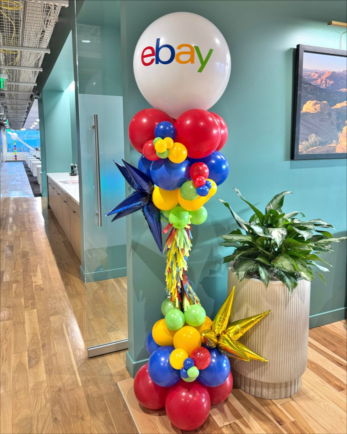 balloon celebration column marks the entrance for ebay's new corporate location