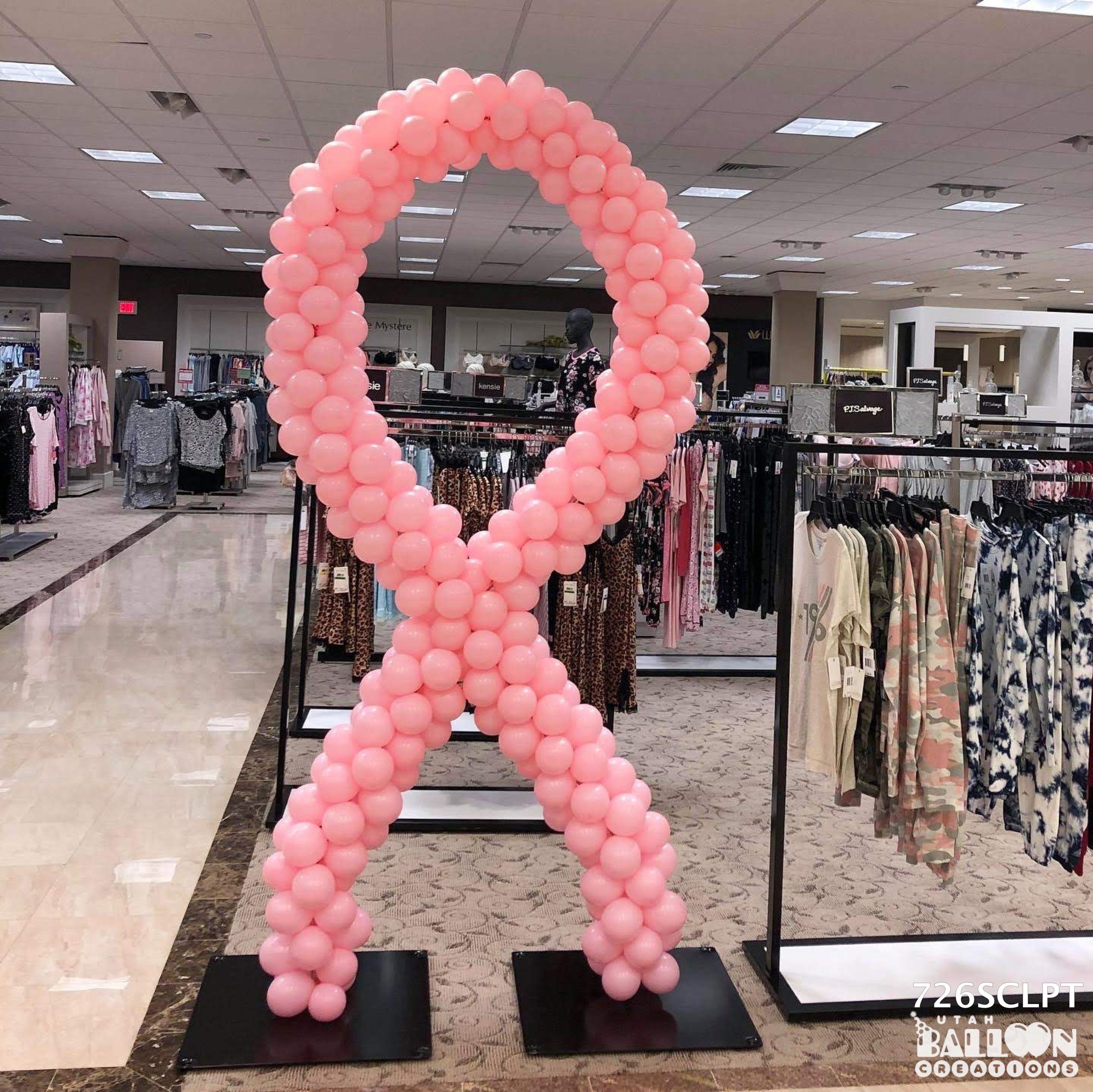 8 foot breast cancer ribbon in department store