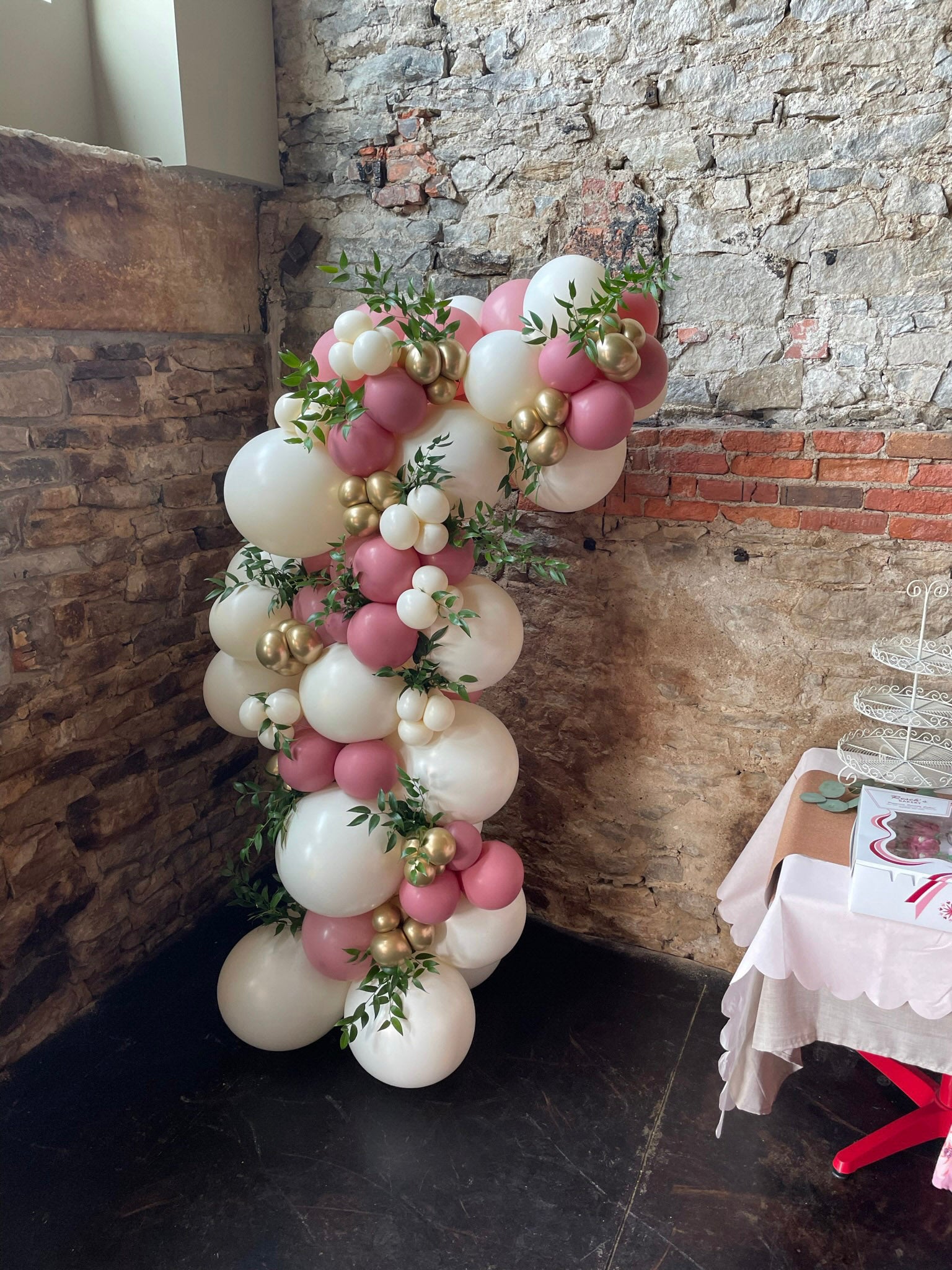 Freestanding Balloon Garland in cream, gold, and dusk rose